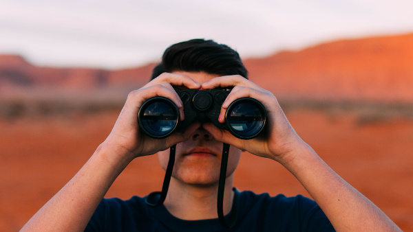 Man with binoculars